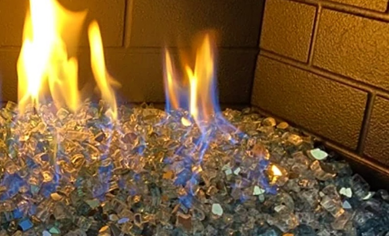 gas fire pit making a hissing noise